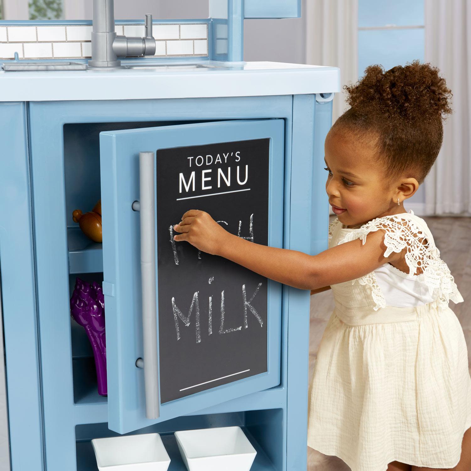 Kids can write their own menu on the built-in chalkboard with the included chalk